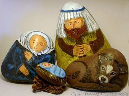 Nativity scene figures painted on rocks